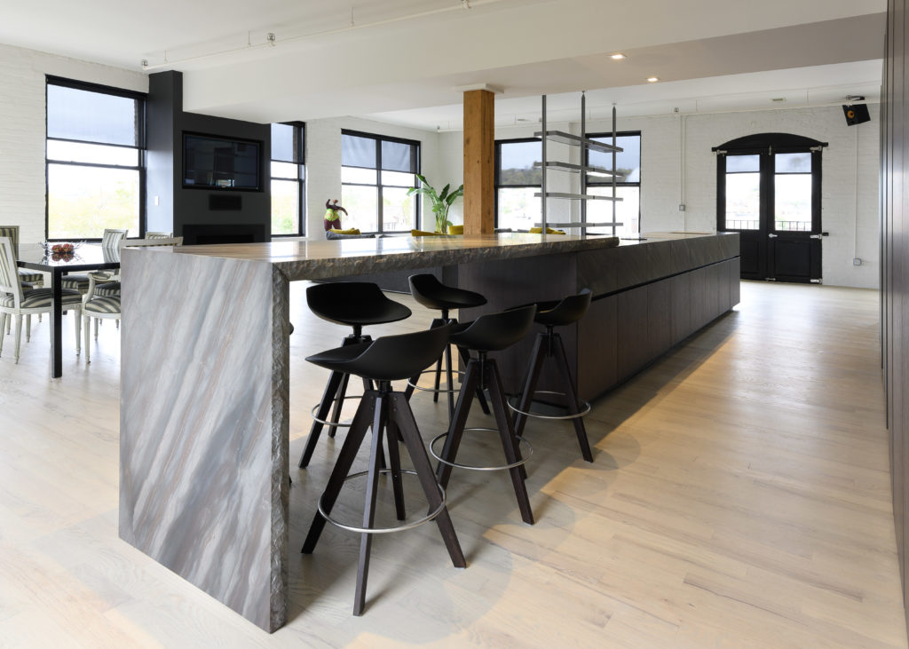 Modern Over the Rhine kitchen in a historic loft