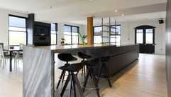 kitchen bar height chairs in a modern kitchen