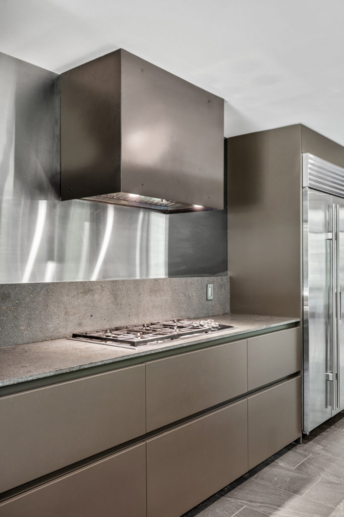 Industrial inspired updraft kitchen hood