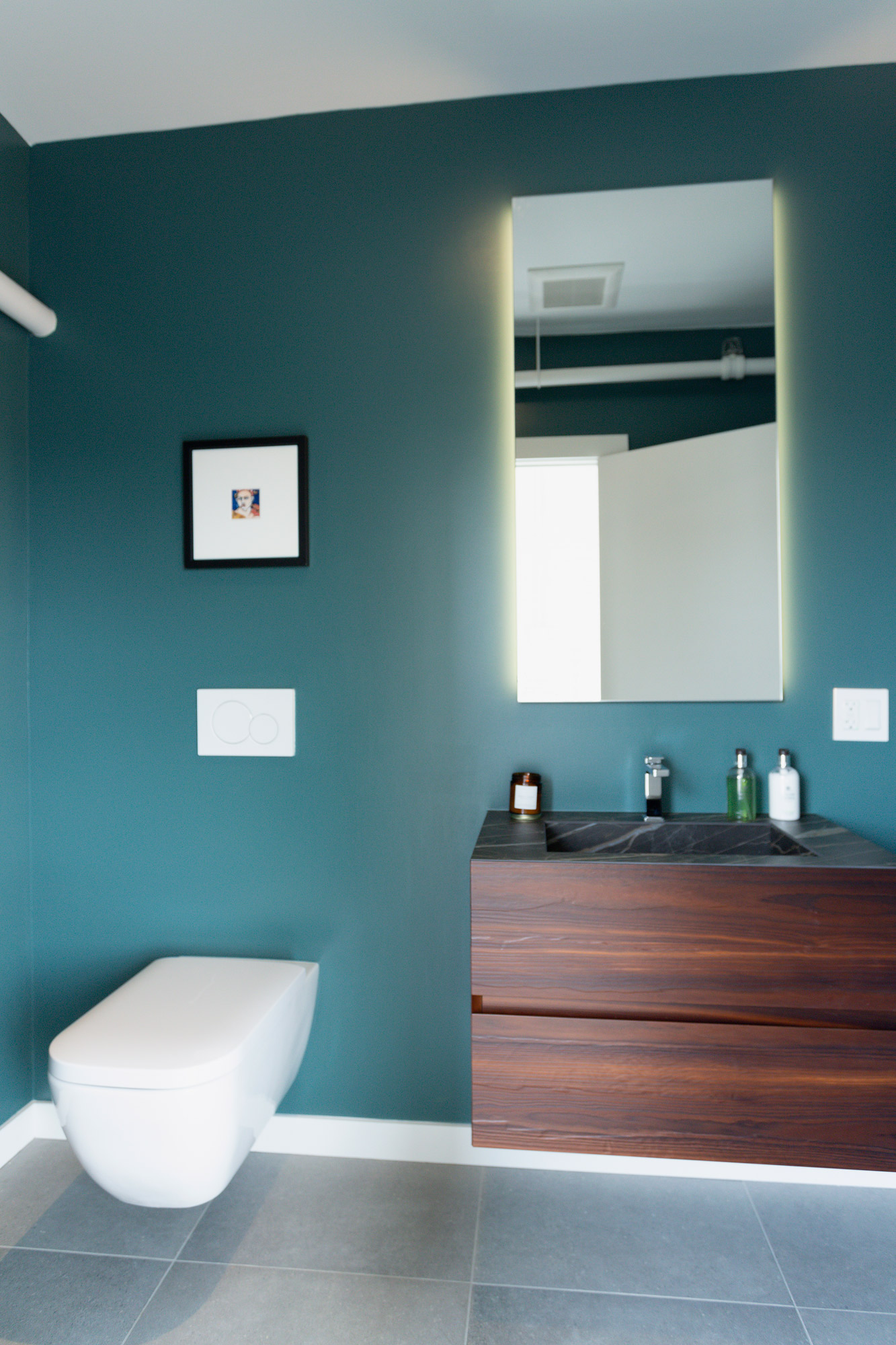 noli-spa-bathroom-blue-walls-vanity