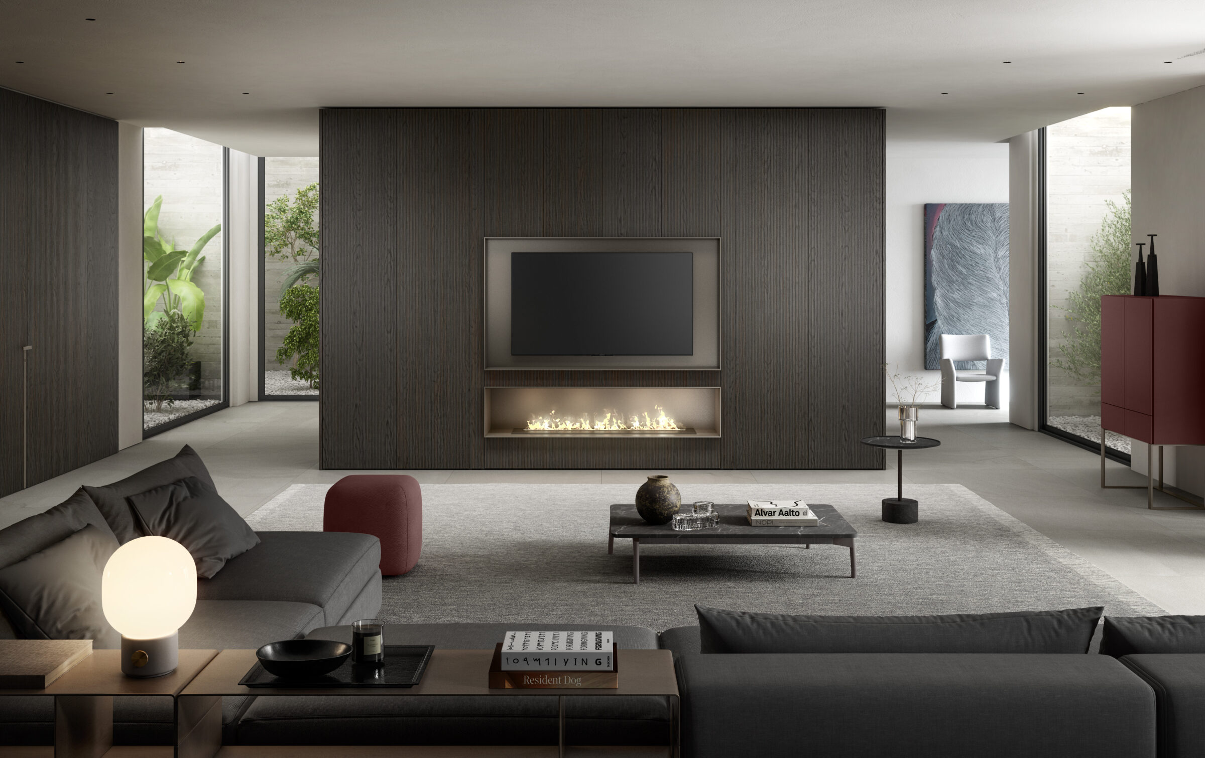 Living room with built in wall-unit that includes a media center. The frame around the media center supports the wall's architecture.